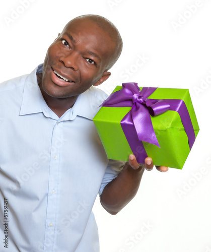 Photo: African man listening on a gift African man listening on a gift