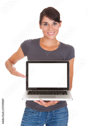 Photo: Young Woman With Laptop Young Woman With Laptop
