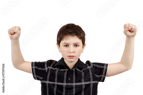 Photo: Portrait of a young boy with hand raised up Portrait of a young boy with hand raised up