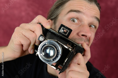 Photo: man with old camera man with old camera
