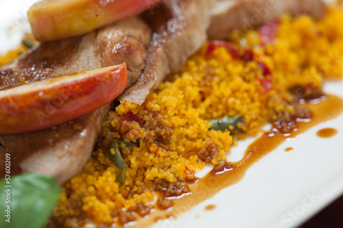 Photo: Close up of couscous with meat and apple Close up of couscous with meat and apple