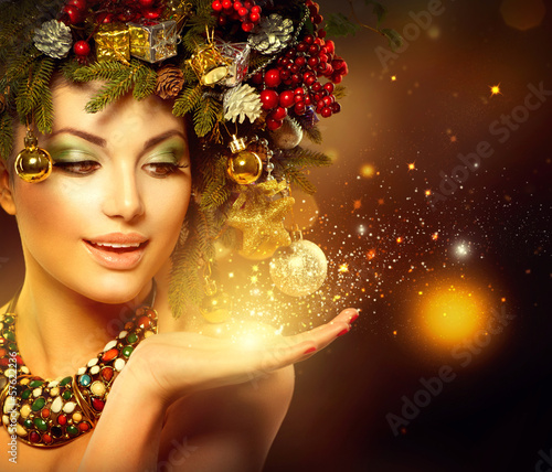 Photo: Christmas Winter Woman with Miracle in Her Hand Christmas Winter Woman with Miracle in Her Hand