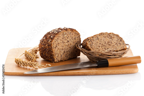 Photo: whole grain bread isolated on white background. whole grain bread isolated on white background.
