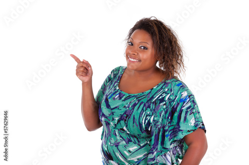 Photo: African American woman smiling pointing something - Black people African American woman smiling pointing something - Black people