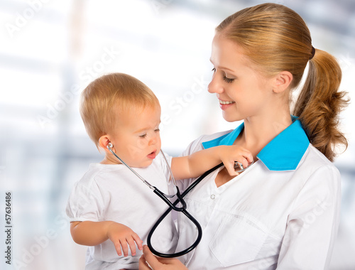 Photo: doctor pediatrician and patient happy child baby doctor pediatrician and patient happy child baby