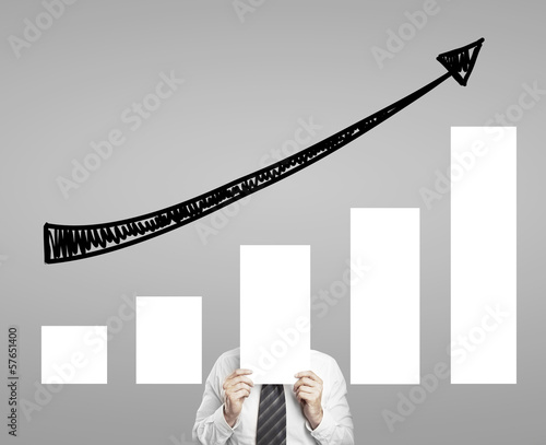 Photo: man holding chart man holding chart