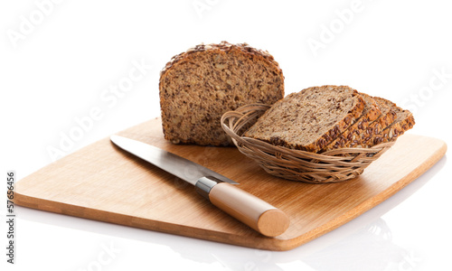 Photo: whole grain bread isolated on white background. whole grain bread isolated on white background.