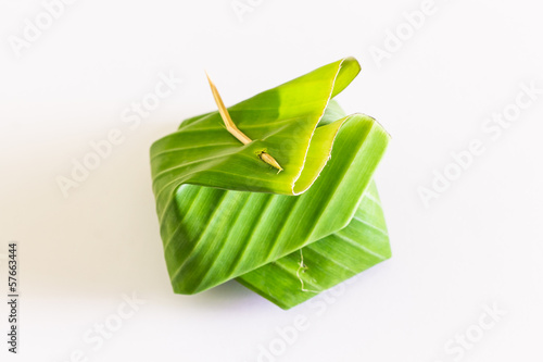 Photo: Thailand dessert ,Wrapped in banana leaves Thailand dessert ,Wrapped in banana leaves