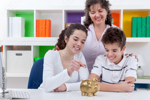 Photo: Family saving money Family saving money