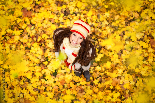 Photo: adorable woman in the autumn park adorable woman in the autumn park