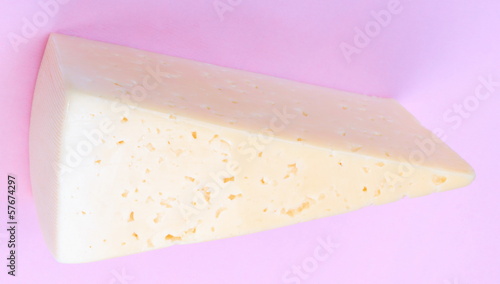 Photo: Cheese on Pink Background Cheese on Pink Background