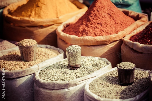 Fototapeta Traditional spices and dry fruits in local bazaar in India.