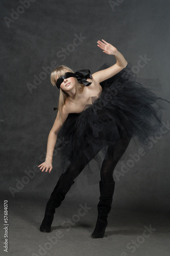 Photo: Blindfolded girl waiting. She weared black tutu skirt Blindfolded girl waiting. She weared black tutu skirt