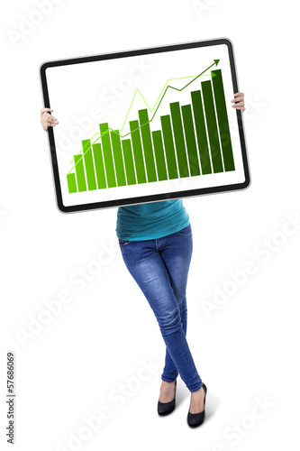 Photo: Woman with growth graph Woman with growth graph