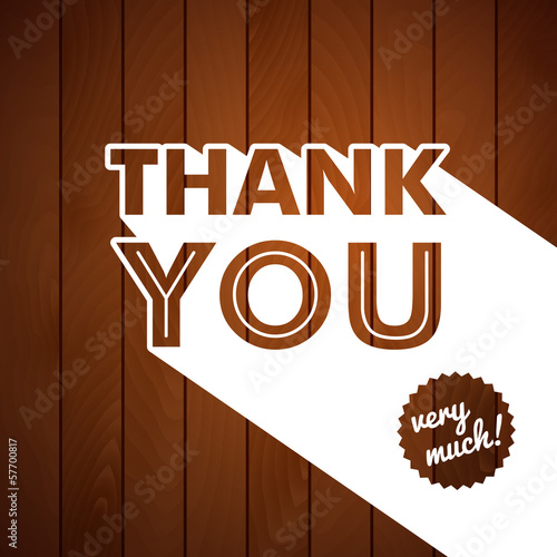 Vector: Thank you card with typography on a wooden background. Thank you card with typography on a wooden background.