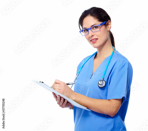 Photo: Medical doctor writing prescription. Medical doctor writing prescription.