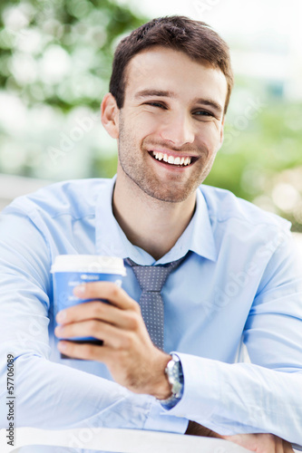 Photo: Young coffee drinker Young coffee drinker