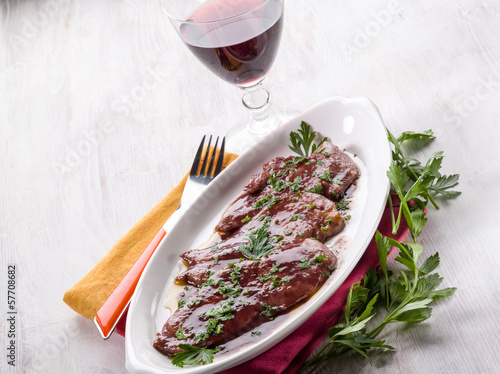 Photo: escalope cooked on red wine escalope cooked on red wine