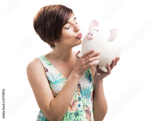 Photo: Kissing a piggy bank Kissing a piggy bank
