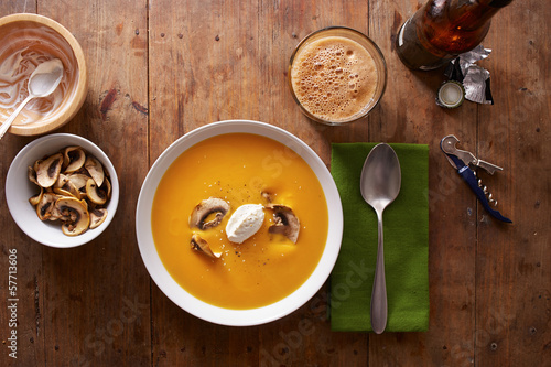 Photo: Pumpkin cream dinner on wooden table Pumpkin cream dinner on wooden table