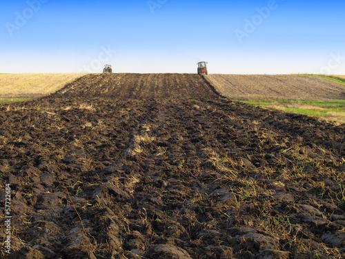 Photo: Tractor Plowing in Autumn Tractor Plowing in Autumn
