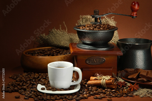 Photo: cup of coffee, grinder, turk and coffee beans cup of coffee, grinder, turk and coffee beans