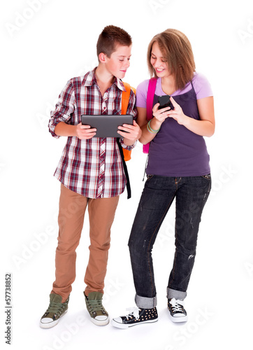 Photo: Teens with mobile devices Teens with mobile devices
