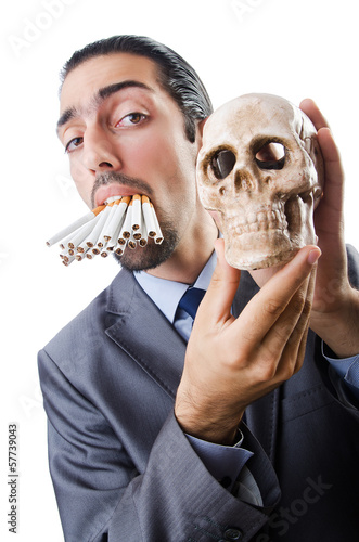 Photo: Antismoking concept with man and skull Antismoking concept with man and skull