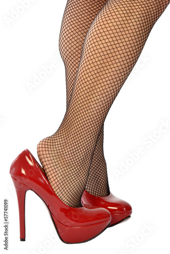 Photo: The sensual legs in fishnet stockings The sensual legs in fishnet stockings