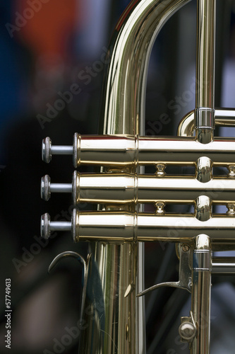 Photo: Close up of a part of a brass music instrument Close up of a part of a brass music instrument