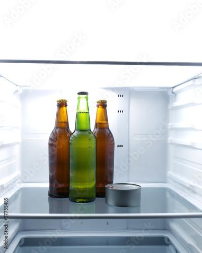 Photo: Bottles with drinks in refrigerator Bottles with drinks in refrigerator