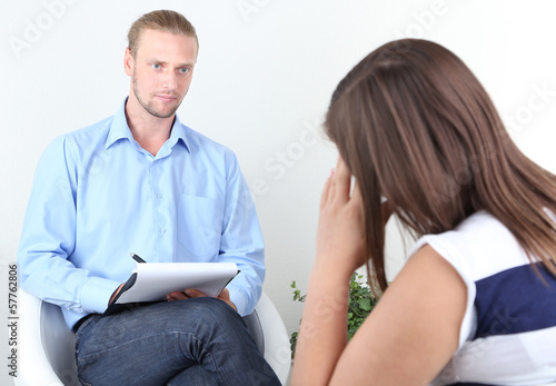 Photo: Woman with problem on reception for psychologist Woman with problem on reception for psychologist
