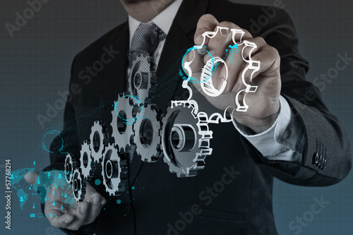 Photo: businessman hand show gear to success businessman hand show gear to success