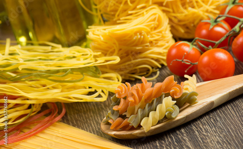 Photo: pasta on a wooden table pasta on a wooden table