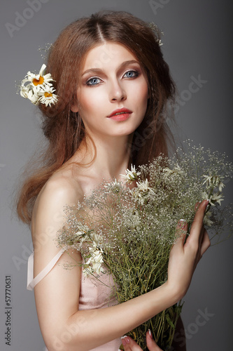 Photo: Sentiment. Portrait of Redhair Nostalgic Woman with Herbs Sentiment. Portrait of Redhair Nostalgic Woman with Herbs