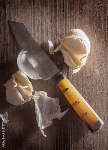 Photo: Garlic and kitchen knife Garlic and kitchen knife
