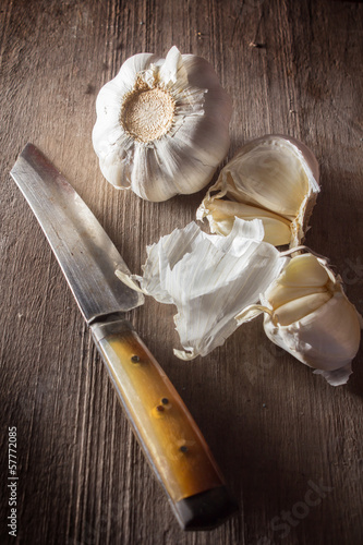 Photo: Kitchen knife with garlic Kitchen knife with garlic