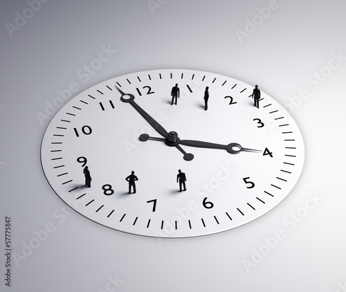 Illustration: Tiny people standing around a clock Tiny people standing around a clock
