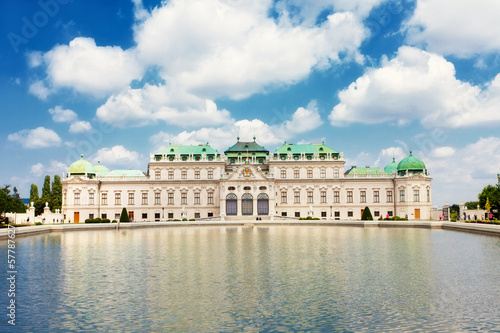 Photo: Belvedere palace is reflected in fountain water, Vienna, Austria Belvedere palace is reflected in fountain water, Vienna, Austria