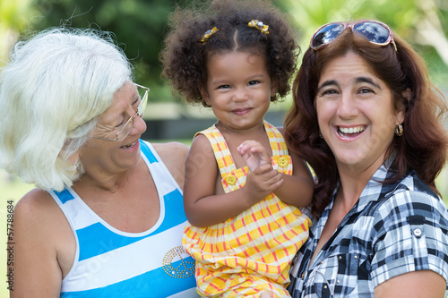 Photo: Hispanic grandma, mother and small daughter Hispanic grandma, mother and small daughter