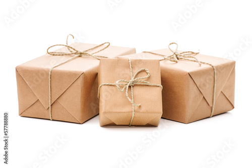 Photo: Parcels wrapped with brown paper Parcels wrapped with brown paper