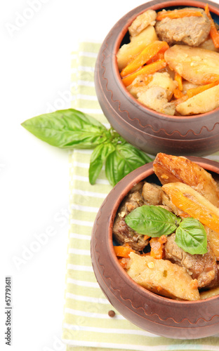 Photo: Homemade beef stir fry with vegetables in pots isolated on Homemade beef stir fry with vegetables in pots isolated on