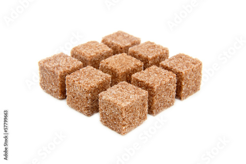 Photo: Cubes of sugar with cinnamon isolated Cubes of sugar with cinnamon isolated