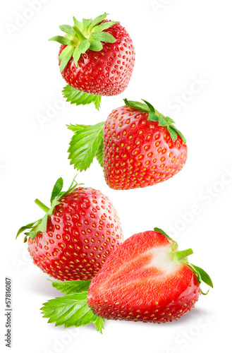  Falling strawberries. Isolated on a white background.