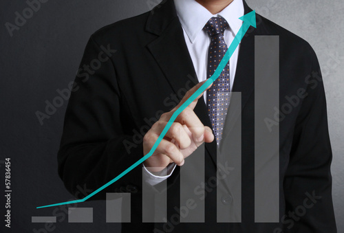 Photo: financial symbols coming from hand financial symbols coming from hand