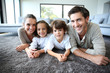 Family at home relaxing on carpet Family at home relaxing on carpet