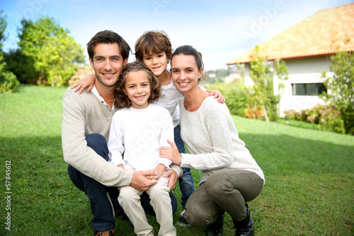 Photo: Cute family portrait of 4 people Cute family portrait of 4 people