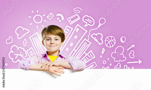 Photo: Cute boy with banner Cute boy with banner