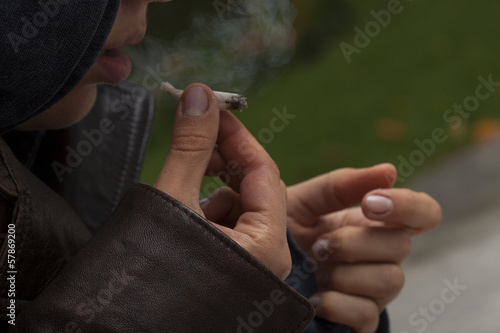 Photo: Girl with a joint Girl with a joint