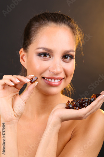 Photo: Portrait of beautiful young girl with caramelized sugar Portrait of beautiful young girl with caramelized sugar